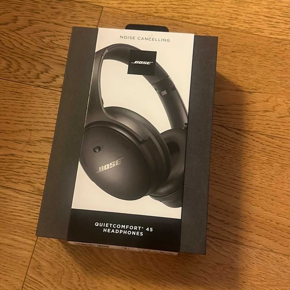 BRAND NEW- never opened, black Bose noise canceling headphones